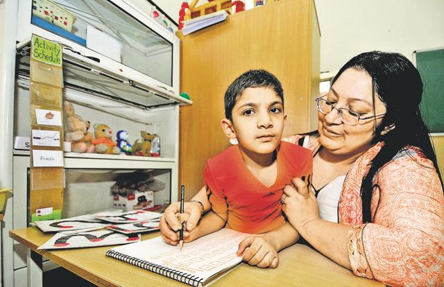 Daksh and Nitima at a practice session at a special school in Chandigarh. (Ravi Kumar/HT Photo) Daksh and Nitima at a practice session at a special school in Chandigarh. (Ravi Kumar/HT Photo)