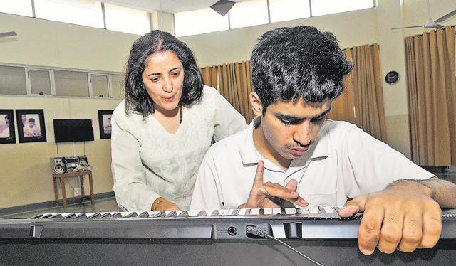 Dhruv is a die-hard music lover and is learning how to play the piano. (Ravi Kumar/HT Photo) Dhruv is a die-hard music lover and is learning how to play the piano. (Ravi Kumar/HT Photo)