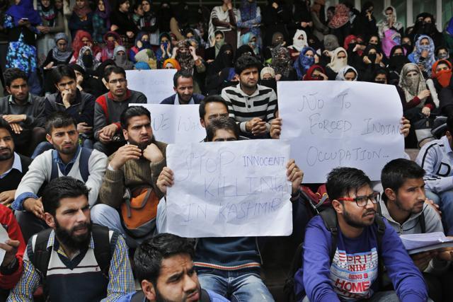University of Kashmir students participate in a protest at the university campus against the recent deaths of civilians allegedly fired upon by Indian security forces during recent protests in Srinagar. (AP) University of Kashmir students participate in a protest at the university campus against the recent deaths of civilians allegedly fired upon by Indian security forces during recent protests in Srinagar. (AP)