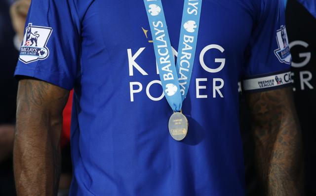 Leicester City's Wes Morgan poses with his medal. (REUTERS) 