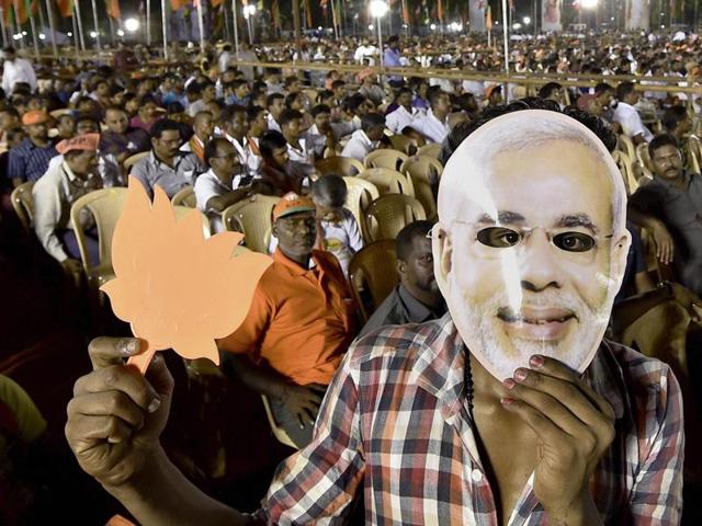 BJP supporters at Prime Minister Narendra Modi's election campaign rally in Chennai. (PTI Photo) BJP supporters at Prime Minister Narendra Modi's election campaign rally in Chennai. (PTI Photo)