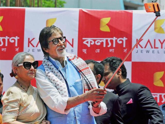 Bollywood actor Amitabh Bachchan takes selfie with wife Jaya Bachchan during the inauguration of a jewellery store. (PTI)