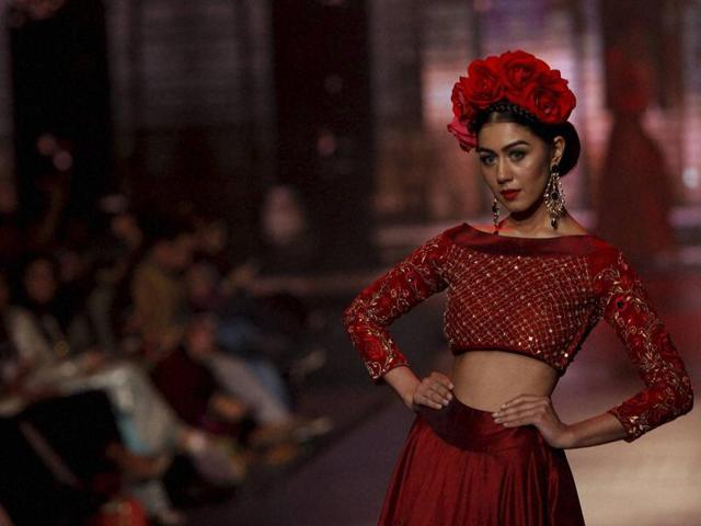 A model in a Yasmin Zaman ensemble at Bridal Couture Week 2016 in Karachi, Pakistan. The event brought an ensemble of nearly two dozen designers who showcased their bridal collections. (AP) A model in a Yasmin Zaman ensemble at Bridal Couture Week 2016 in Karachi, Pakistan. The event brought an ensemble of nearly two dozen designers who showcased their bridal collections. (AP)
