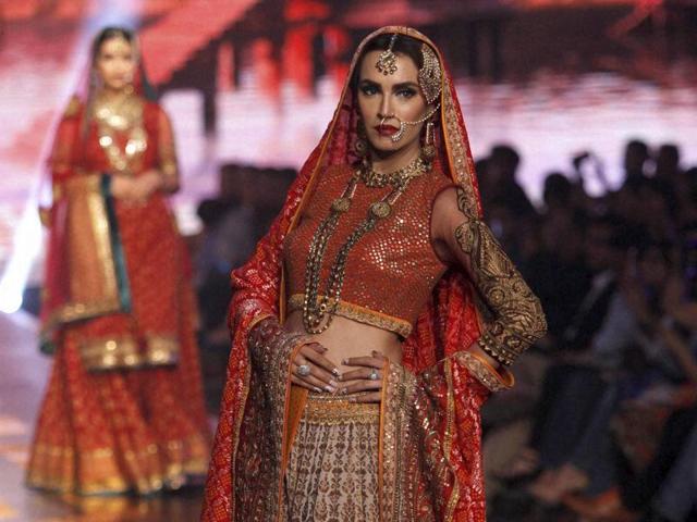 A model presents a creation by Pakistani designing label Bibi London during Bridal Couture Week 2016 in Karachi. (AP) A model presents a creation by Pakistani designing label Bibi London during Bridal Couture Week 2016 in Karachi. (AP)