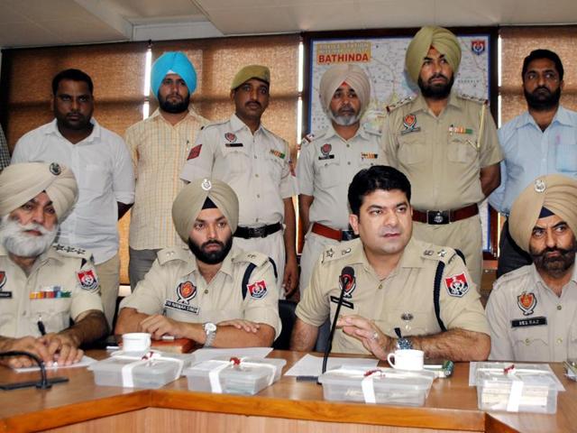 Police interacting with the media during a press conference in Bathinda on Monday.(Sanjeev Kumar/HT Photo)