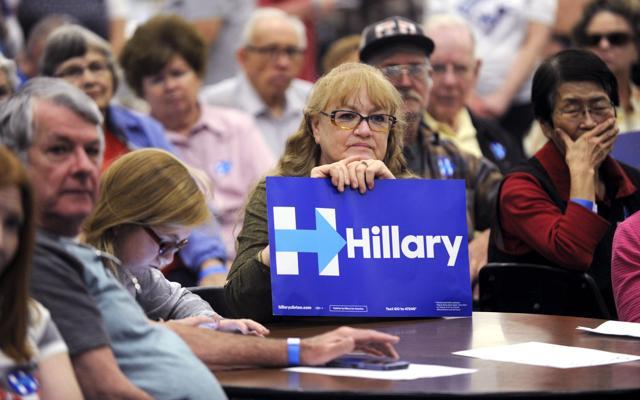 Hillary Clinton's supporter Shirley Boggs holds a sign during the Democratic Caucus for the US Democratic presidential candidate at the Emporia High School in Emporia, Kansas. (REUTERS) Hillary Clinton's supporter Shirley Boggs holds a sign during the Democratic Caucus for the US Democratic presidential candidate at the Emporia High School in Emporia, Kansas. (REUTERS)