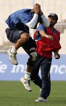 Yuvraj Singh jumps in air as teammate Sachin Tendulkar throws the ball during a training session at The Eden Gardens Stadium in Kolkata, 28 November 2007, ahead of the second Test match between India and Pakistan. (AFP) Yuvraj Singh jumps in air as teammate Sachin Tendulkar throws the ball during a training session at The Eden Gardens Stadium in Kolkata, 28 November 2007, ahead of the second Test match between India and Pakistan. (AFP)