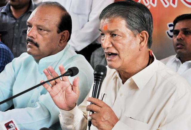 File photo of sacked Uttarakhand chief minister Harish Rawat addressing the media in Dehradun. (PTI) File photo of sacked Uttarakhand chief minister Harish Rawat addressing the media in Dehradun. (PTI)