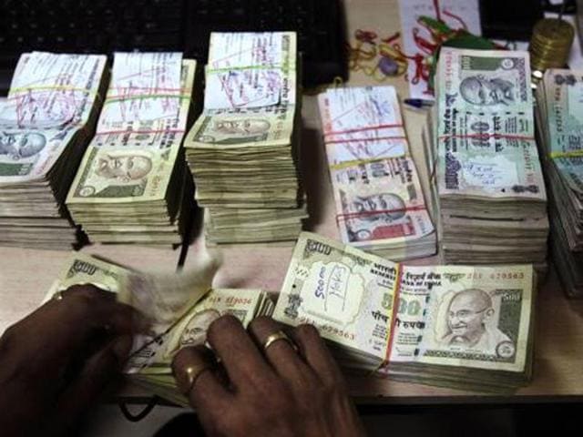 The draft norms that 60% of a group’s income should come from financial services disqualifies big business houses, and encourages NBFCs to expand their business and reduce cost of funds.(AP Photo) The draft norms that 60% of a group’s income should come from financial services disqualifies big business houses, and encourages NBFCs to expand their business and reduce cost of funds.(AP Photo)
