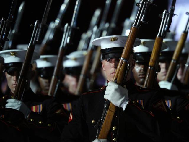 Members of the US Marines Silent Drill Platoon participate in a parade. (AFP) Members of the US Marines Silent Drill Platoon participate in a parade. (AFP)