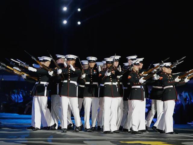 The US Marine Corps Silent Drill team performs during the opening ceremony. (AP) The US Marine Corps Silent Drill team performs during the opening ceremony. (AP)