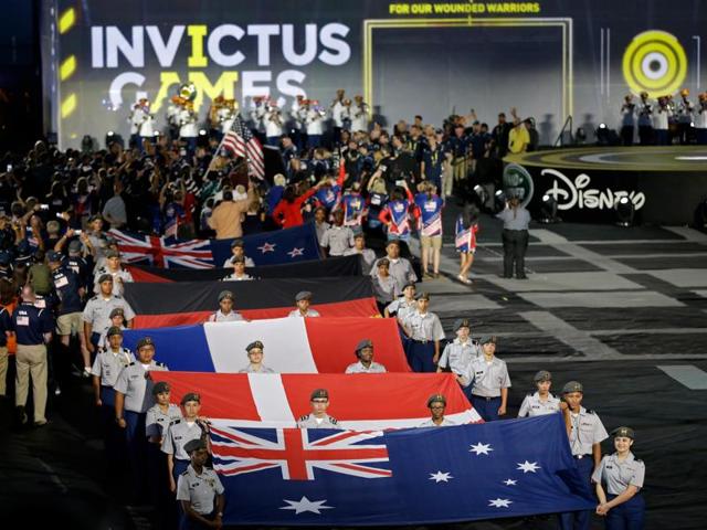 Flags of some of the participating nations are displayed during the opening ceremony for the Invictus Games in Kissimmee. A total of 14 nations will participate in the games. (AP) Flags of some of the participating nations are displayed during the opening ceremony for the Invictus Games in Kissimmee. A total of 14 nations will participate in the games. (AP)
