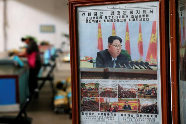 Newspapers with pictures of North Korean leader Kim Jong Un addressing the ruling Workers' Party congress are placed inside one of halls of the Kim Jong Suk Pyongyang textile mill during a government organised visit for foreign reporters in Pyongyang, North Korea May 9, 2016. (REUTERS)