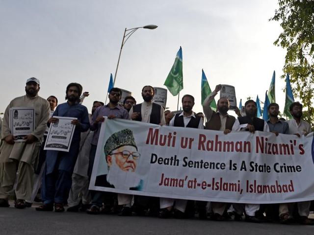 Jamaat-e-Islami Activists march in a protest against the death sentence for Motiur Rahman Nizami in Islamabad on Sunday. (AFP) Jamaat-e-Islami Activists march in a protest against the death sentence for Motiur Rahman Nizami in Islamabad on Sunday. (AFP)