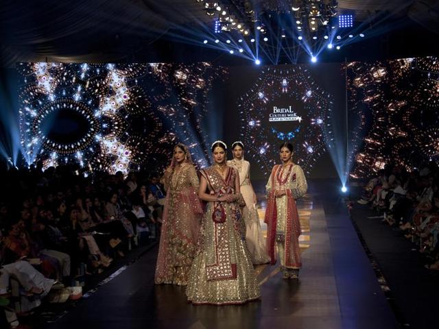 Models present creations by Pakistani designer Ayesha Ibrahim during Bridal Couture Week 2016 in Karachi, Pakistan. (AP) Models present creations by Pakistani designer Ayesha Ibrahim during Bridal Couture Week 2016 in Karachi, Pakistan. (AP)