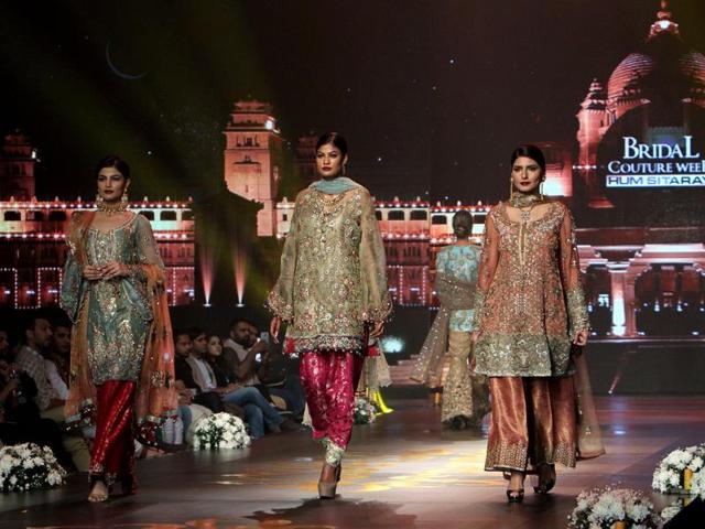 Models present creations by Pakistani designing label Nickie Nina Concepts. The three-day bridal event continues till Sunday, May 8. (AP) Models present creations by Pakistani designing label Nickie Nina Concepts. The three-day bridal event continues till Sunday, May 8. (AP)