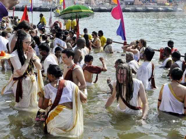 Naga Sadhus took a holy dip at Dutta Akhara Ghat in Kshipra river in Ujjain on Monday on the occasion of second Shahi Snan. (Arun Mondhe/ HT photo) Naga Sadhus took a holy dip at Dutta Akhara Ghat in Kshipra river in Ujjain on Monday on the occasion of second Shahi Snan. (Arun Mondhe/ HT photo)