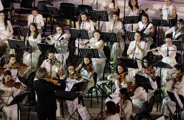 Musicians perform during the concert in the ancient theatre of Syria's Palmyra after Syrian troops backed by Russian air strikes and special forces on the ground recaptured the UNESCO world heritage site from Islamic State group fighters in March. (AFP) Musicians perform during the concert in the ancient theatre of Syria's Palmyra after Syrian troops backed by Russian air strikes and special forces on the ground recaptured the UNESCO world heritage site from Islamic State group fighters in March. (AFP)