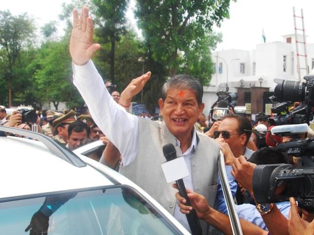 Chief minister Harish Rawat outside the assembly after floor test in Dehradun on Tuesday. (Vinay Santosh Kumar /HT Photo) Chief minister Harish Rawat outside the assembly after floor test in Dehradun on Tuesday. (Vinay Santosh Kumar /HT Photo)