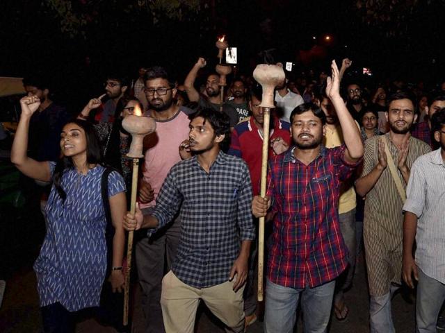 JNUSU president Kanhaiya Kumar with Umar Khalid and other students during a torch parade at JNU campus in New Delhi, 27 April 2016 (PTI) JNUSU president Kanhaiya Kumar with Umar Khalid and other students during a torch parade at JNU campus in New Delhi, 27 April 2016 (PTI)