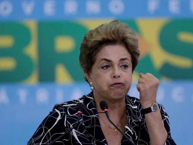 Sao Paulo : People protest next to large inflatable doll of Brazil's President Dilma Rousseff wearing a presidential sash with the words "Goodbye dear" and "Mother of Big Oil" written in Portuguese, in Sao Paulo, Brazil, Monday, May 9, 2016. (AP) Sao Paulo : People protest next to large inflatable doll of Brazil's President Dilma Rousseff wearing a presidential sash with the words "Goodbye dear" and "Mother of Big Oil" written in Portuguese, in Sao Paulo, Brazil, Monday, May 9, 2016. (AP)