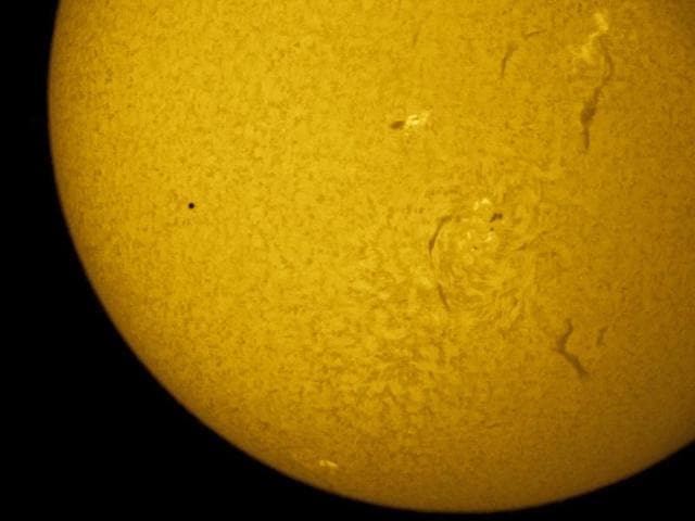 The transit of Mercury, left, in front of the Sun is seen from St.Petersburg, Russia. (AP Photo) The transit of Mercury, left, in front of the Sun is seen from St.Petersburg, Russia. (AP Photo)