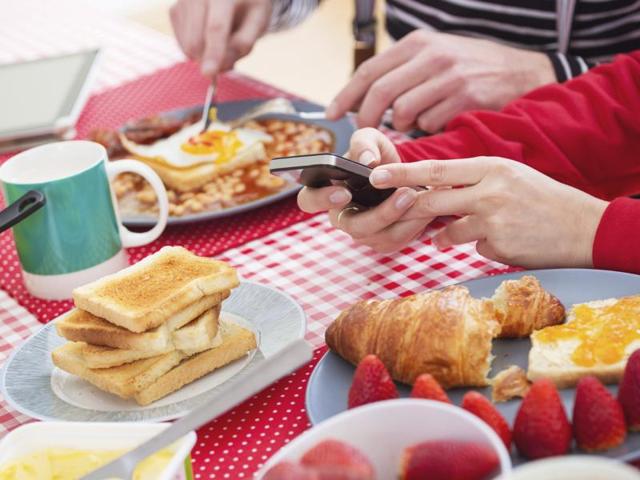Texting or talking on the phone is considered appropriate, whereas checking social networking sites is not. (iStock) Texting or talking on the phone is considered appropriate, whereas checking social networking sites is not. (iStock)