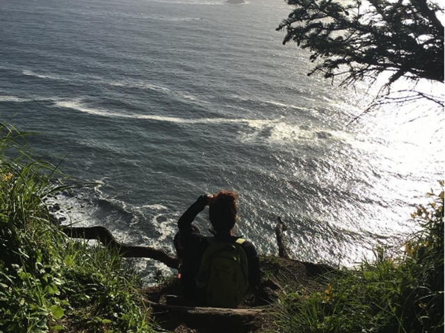 After a long trek, Nimrat catches her breath on the coast. 