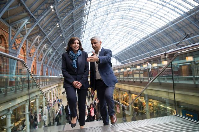 Mayor of London Sadiq Khan speaks with Mayor of Paris Anne Hidalgo as they meet at St Pancras Station in London on May 10, 2016. (AFP) Mayor of London Sadiq Khan speaks with Mayor of Paris Anne Hidalgo as they meet at St Pancras Station in London on May 10, 2016. (AFP)