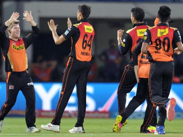 Sunrisers Hyderabad captain David Warner (L) celebrates with his teammates after winning the match against Rising Pune Supergiants. (AFP Photo) Sunrisers Hyderabad captain David Warner (L) celebrates with his teammates after winning the match against Rising Pune Supergiants. (AFP Photo)
