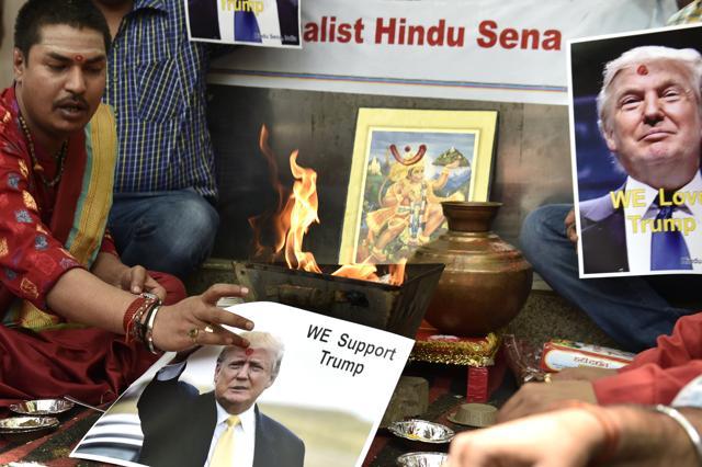 Hindu Sena holding We Support Trump posters at the hawan near Jantar Mantar in New Delhi on Wednesday. (Arvind Yadav/HT Photo) Hindu Sena holding We Support Trump posters at the hawan near Jantar Mantar in New Delhi on Wednesday. (Arvind Yadav/HT Photo)