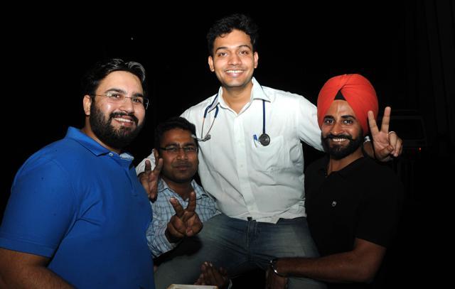 Rakesh Kumar Mihas with his friends in Patiala on Tuesday. (Bharat Bhushan/HT Photo)