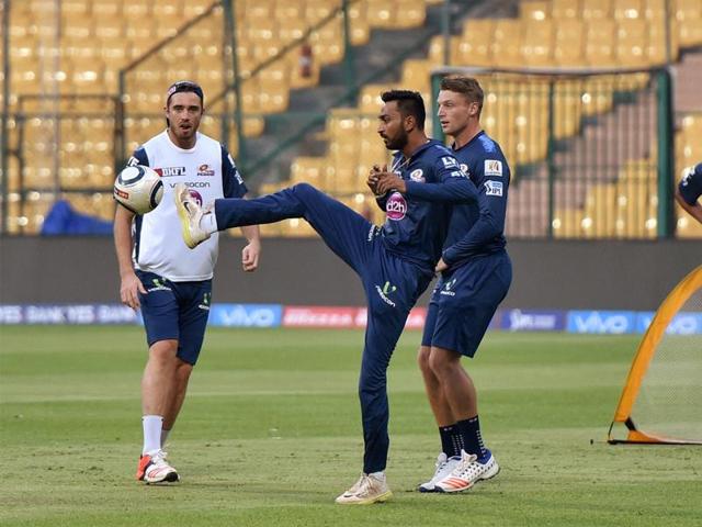 Mumbai Indians players Jos Buttler and Martin Guptill during a training session ahead of their game against Royal Challengers Bangalore. (PTI) Mumbai Indians players Jos Buttler and Martin Guptill during a training session ahead of their game against Royal Challengers Bangalore. (PTI)