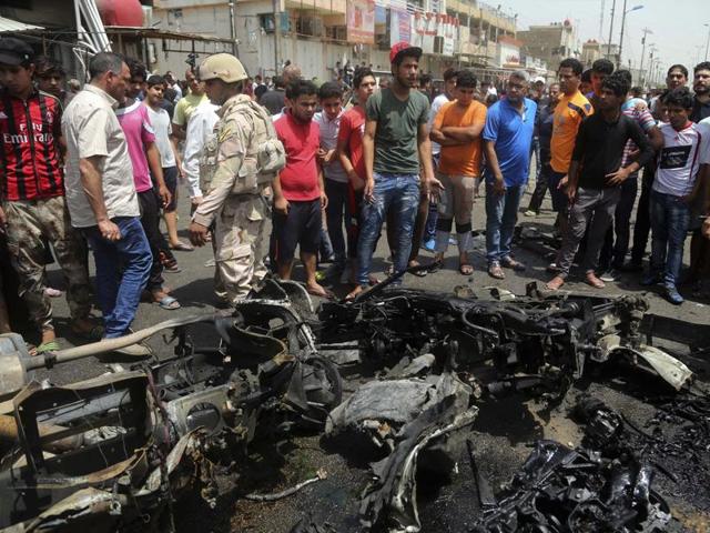 Three car bombs in Baghdad, including a huge blast at a market in a Shiite area, killed at least 94 people on Wednesday, the bloodiest day in the Iraqi capital this year. (AP Photo) Three car bombs in Baghdad, including a huge blast at a market in a Shiite area, killed at least 94 people on Wednesday, the bloodiest day in the Iraqi capital this year. (AP Photo)