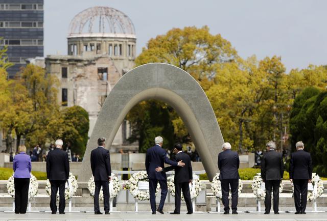 US secretary of state John Kerry puts his arm around Japanese foreign minister Fumio Kishida after they and fellow G7 foreign ministers laid wreaths at the cenotaph at Hiroshima Peace Memorial Park. (AP File Photo) US secretary of state John Kerry puts his arm around Japanese foreign minister Fumio Kishida after they and fellow G7 foreign ministers laid wreaths at the cenotaph at Hiroshima Peace Memorial Park. (AP File Photo)