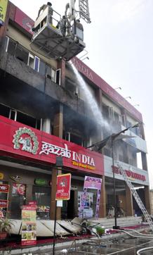 The Panchkula fire department pressed six fire tenders into action and called one each from Kalka, Barwala and the Western Command army headquarters, besides procuring a hydraulic ladder from Chandigarh. (Sant Arora/HT Photo)