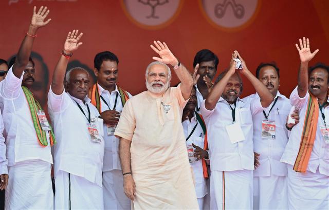 Prime Minister Narendra Modi waves to crowd at an election rally at Thethakudi in Nagappatinam district in Tamil Nadu on Wednesday. (PTI) Prime Minister Narendra Modi waves to crowd at an election rally at Thethakudi in Nagappatinam district in Tamil Nadu on Wednesday. (PTI)