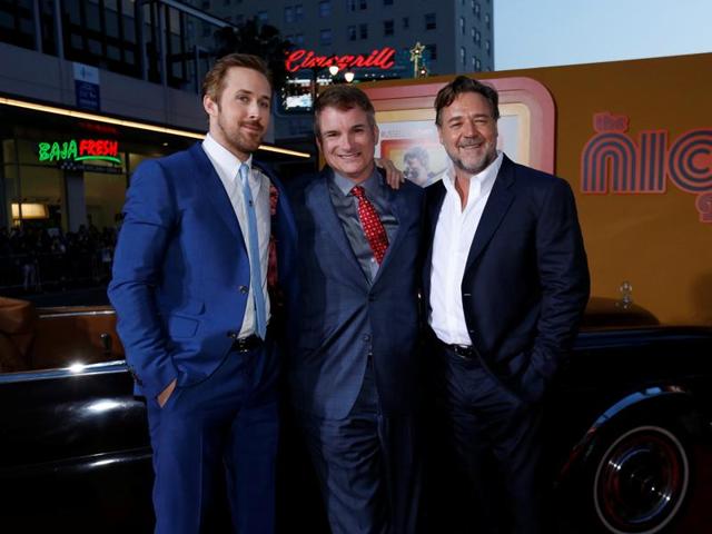 Director of the movie Shane Black (C) poses with cast members Ryan Gosling and Russell Crowe at the premiere of The Nice Guys. (REUTERS)