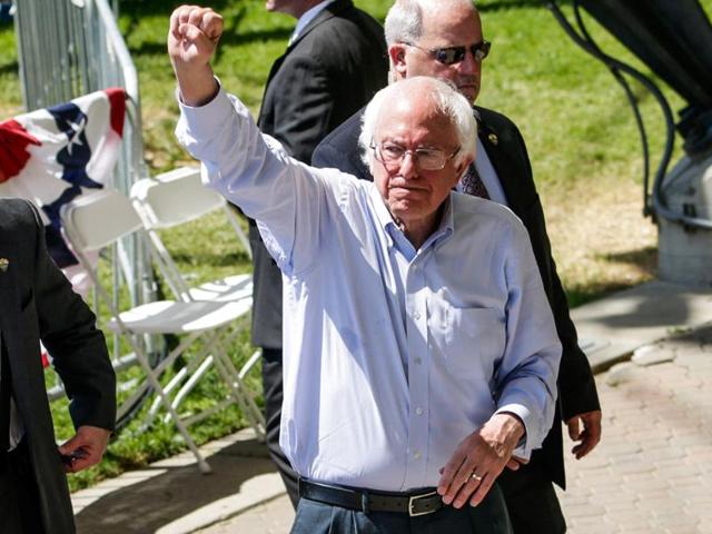 US Democratic presidential candidate Bernie Sanders waves to the crowd as he leaves a campaign rally surrounded by secret service agents in Stockton, California, United States on Tuesday. (Reuters) US Democratic presidential candidate Bernie Sanders waves to the crowd as he leaves a campaign rally surrounded by secret service agents in Stockton, California, United States on Tuesday. (Reuters)