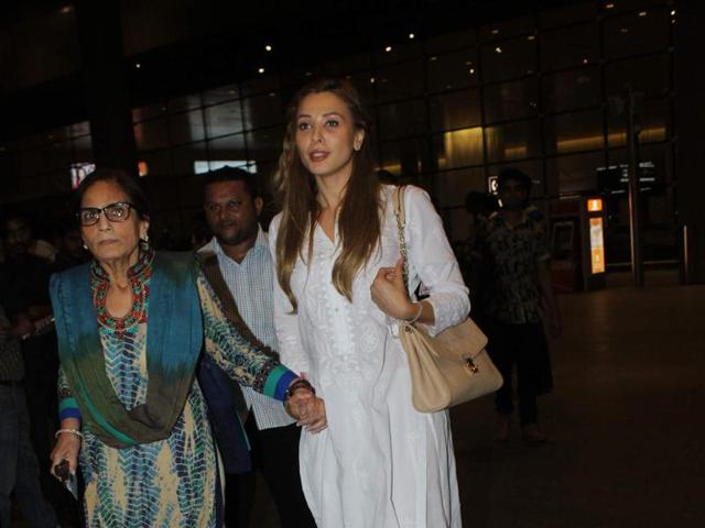 The Romanian actor-model caringly held onto Salma’s hand.  (Viral Bhayani/HT) 