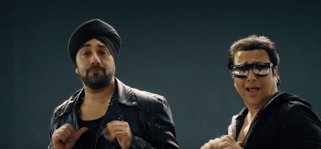 Jassi and Govinda in a still from the video.