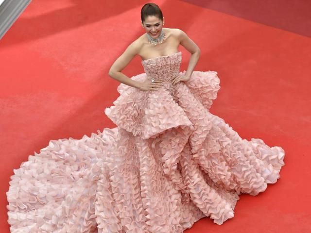 British-Thai actor Araya Hargate made several heads turn in her full pastel gown. (AFP) British-Thai actor Araya Hargate made several heads turn in her full pastel gown. (AFP)