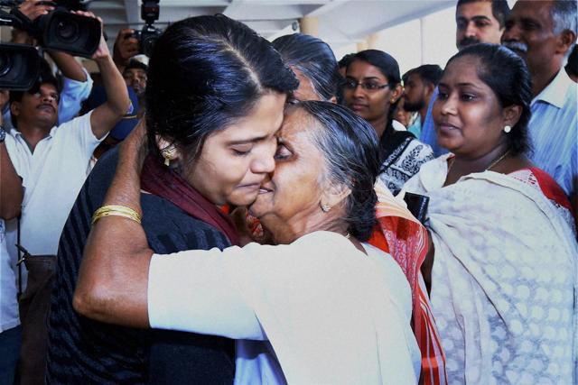 The first batch of 18 Keralites, evacuated from Libya, meet their families on their arrival at Kochi on Thursday. A war of words has broken out between CM Oommen Chandy and external affairs minister Sushma Swaraj for taking credit for the evacuation. (PTI) The first batch of 18 Keralites, evacuated from Libya, meet their families on their arrival at Kochi on Thursday. A war of words has broken out between CM Oommen Chandy and external affairs minister Sushma Swaraj for taking credit for the evacuation. (PTI)