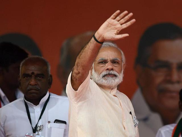 Prime Minister Narendra Modi waves to a crowd at an election rally at Thethakudi in Nagappatinam district of Tamil Nadu. (PTI Photo) Prime Minister Narendra Modi waves to a crowd at an election rally at Thethakudi in Nagappatinam district of Tamil Nadu. (PTI Photo)