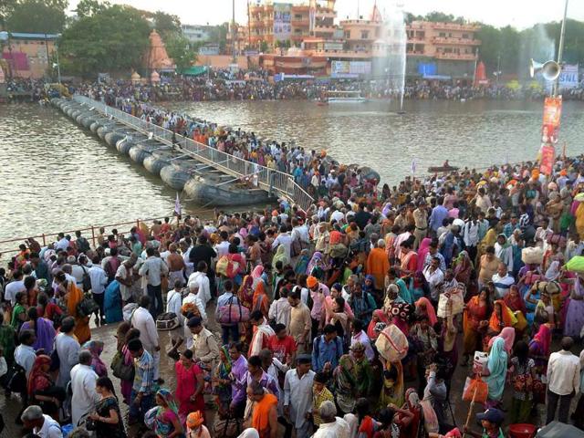 Devotees gather to take holy dip in River Kshipra during Simhastha Maha Kumbh Mela in Ujjain. (PTI) 