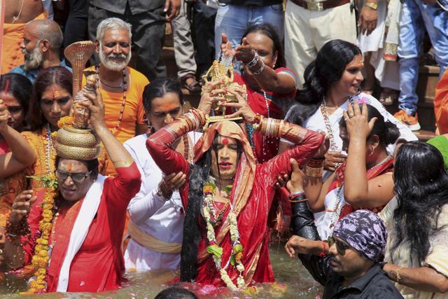 Mahamandaleshwar of transgenders Akhara Laxmi Narayan Tripathi taking 'Royal bath' at Ramghat in Kshipra river during Simhastha Mahakumbh mela in Ujjain on May 11. (PTI)