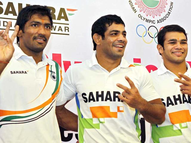 Their paths were never meant to meet. But with International wrestling body scrapping the 66kg division, two-time Olympics medallist Sushil Kumar (centre) and the younger Narsingh Yadav (right) are eyeing the same spot at the 74 kg division in the Rio Olympics. (PTI) Their paths were never meant to meet. But with International wrestling body scrapping the 66kg division, two-time Olympics medallist Sushil Kumar (centre) and the younger Narsingh Yadav (right) are eyeing the same spot at the 74 kg division in the Rio Olympics. (PTI)