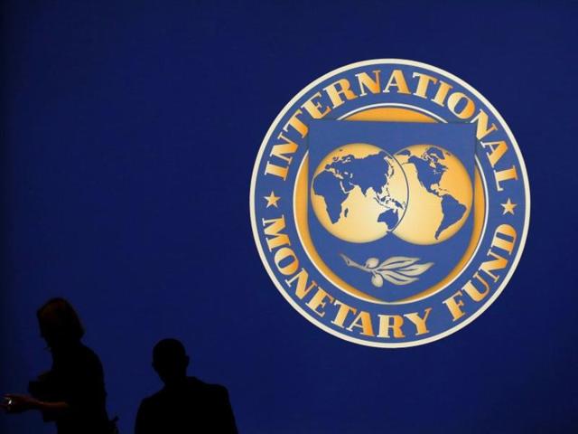 Visitors are silhouetted against the logo of the International Monetary Fund at the main venue for the IMF and World Bank annual meeting in Tokyo in 2012. (Reuters) Visitors are silhouetted against the logo of the International Monetary Fund at the main venue for the IMF and World Bank annual meeting in Tokyo in 2012. (Reuters)