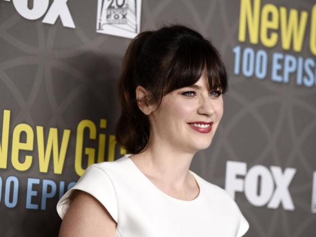 Zooey Deschanel and Kermit the Frog talk on stage during WE Day California on April 7, 2016. (REUTERS) Zooey Deschanel and Kermit the Frog talk on stage during WE Day California on April 7, 2016. (REUTERS)