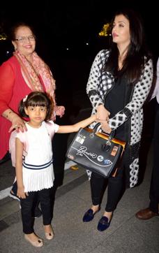 Aishwarya holds her daughter’s hand as they leave for Cannes. (Yogen Shah/HT photo) Aishwarya holds her daughter’s hand as they leave for Cannes. (Yogen Shah/HT photo)